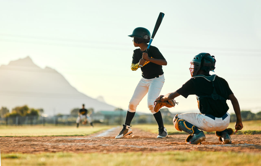 youth baseball player at bat