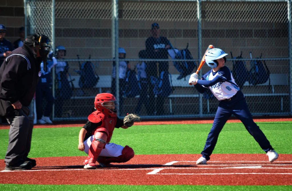 District 37 Little League Players playing baseball at Cyclone Ballpark