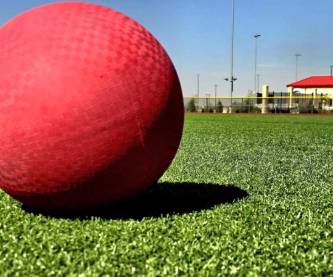 Red kickball on a Cyclone Ballparks Field